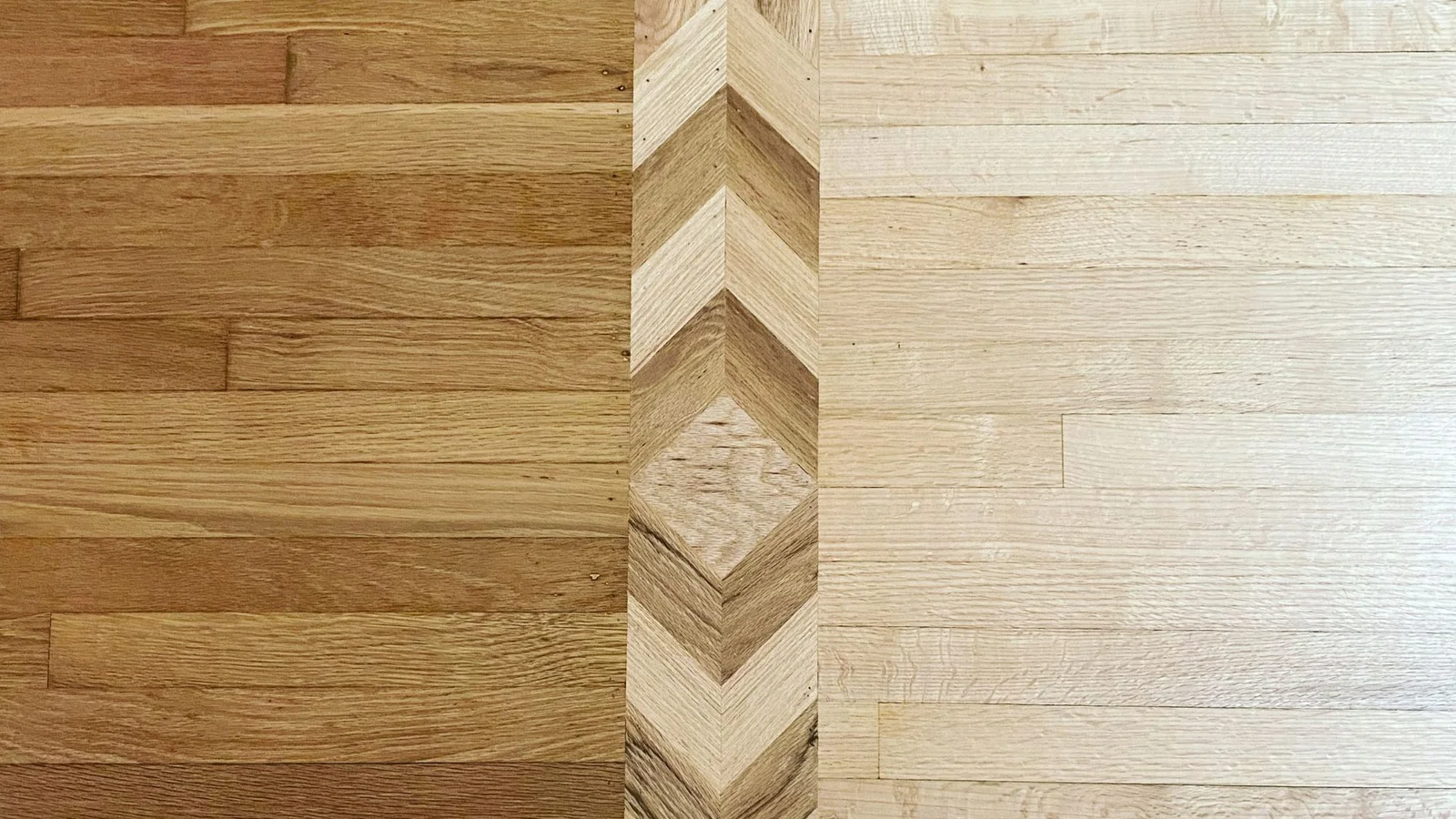 Custom hardwood inlay with geometric diamond pattern in contrasting oak and light wood tones